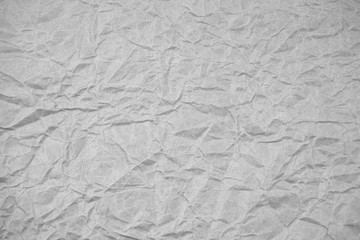 White crumpled packaging paper background texture. Grey Kraft Paper Coarse. Wrinkled paper bag