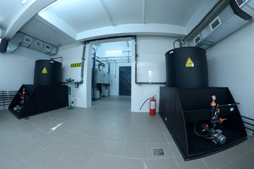 Wall Mural - At the dosing systems hall of the water pumping station: sodium hypochlorite storage tanks and dosing system