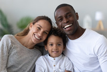 Portrait Of Happy Multiracial Family With Little Biracial Son
