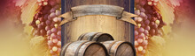 Wine Background With A Wooden Signboard, Bunches Of Red Grape And Oak Barrels. Template Of Billboard With Grapevine And Old Casks For A Presentation Of Alcohol Drinks, Wine Making Industry Or Winery.