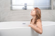 © yaophotograph - Portrait of young attractive asian girl takes a bath with candles relax in the bathroom. Beauty woman in spa treatments. Healthy perfect glow skin care concept
