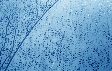 Wet plastic transparent old wrap texture in navy blue tone.