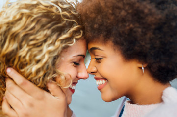 Loving lesbian couple at the street. LGTB concept