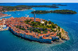 Aerial panoramic view of romantic and historic Town of Rovinj on sunny summer day, Istra, Croatia