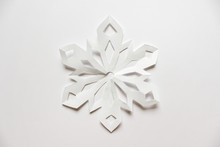 Large White Snowflake On White Backgound