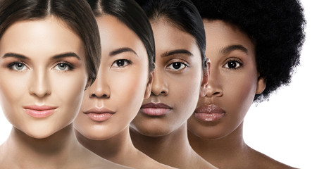 Wall Mural - Different ethnicity women - Caucasian, African, Asian and Indian.