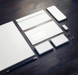 Wall Mural - Blank stationery and corporate identity template on wood table background. Responsive design mockup.