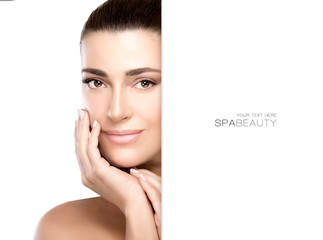 Wall Mural - beautiful model girl with hand on face. skincare concept