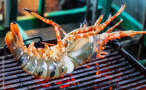 Fotografía Lobster grill steamed flames sizzling Food Background