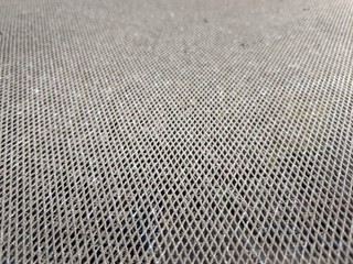 Small metal mesh close up, wire netting texture background