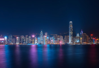 Wall Mural - Hong Kong cityscape at night. View From Victoria Harbour