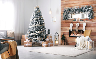 festive interior with decorated christmas tree and fireplace
