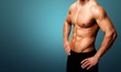 © BillionPhotos.com - Cropped image of fit muscular body of sportsman