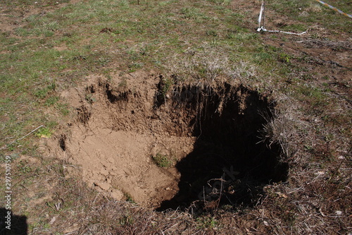 Fotografía Terelle, Italy - March 15, 2009: The small sinkhole in the Terelle countryside i
