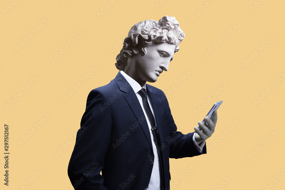 Modern art collage. Concept portrait of a  businessman  holding mobile smartphone using app texting sms message. Gypsum head of of Apollo. Man in suit. - obrazy, fototapety, plakaty 