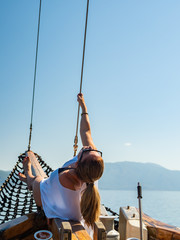 Wall Mural - Woman sailing in the Ionian sea