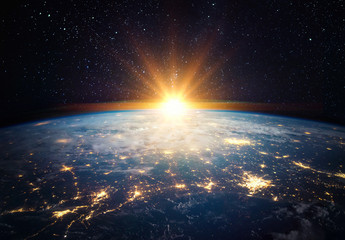 Wall Mural - earth, sun, star and galaxy. sunrise over planet earth, view from space. elements of this image furn