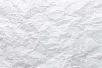 Wall Mural - Top view closeup sheet of white crumpled uneven paper. Abstract modern trendy texture background
