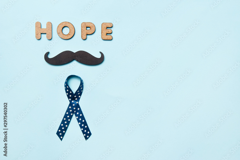 Blue ribbons with mustache and word hope. Prostate Cancer Awareness. Men health awareness. Movember concept - obrazy, fototapety, plakaty 