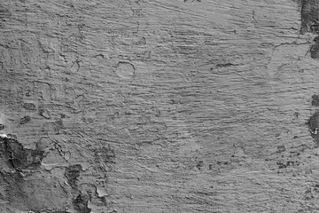 Texture of a concrete wall with cracks and scratches which can be used as a background