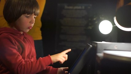 Poster - The boy asks for help from an assistant to help deal with the computer