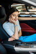 © LIGHTFIELD STUDIOS - upset woman sitting in new modern car