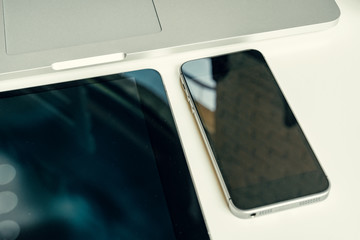 Poster - close up shot of digital devices on office table
