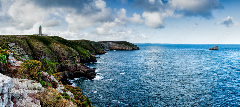 panorama coastal landscape with cliffs and a lighthouse - obrazy, fototapety, plakaty 