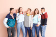 © Pixel-Shot - Portrait of teenagers on color background