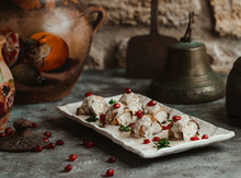 Aubergine Rolls Stuffed With Herbs, Cream Cheese Garnished With Pomegranates
