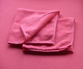 Poster - pink towels in a fold on a pink background