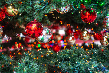 christmas ornaments on the christmas tree with bokeh background ball