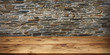 © gudrun - Wood surface in front of old stone wall