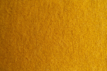 Wall Mural - View of amber yellow woolen fabric from above