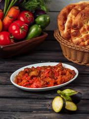 Wall Mural - small platter of side dish with fried aubergine, tomato and pepper