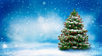beautiful christmas snowy background. christmas tree decorated with red balls in snowfall. winter la