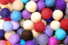 Background Of Many Felt Balls For Sale As Decorations