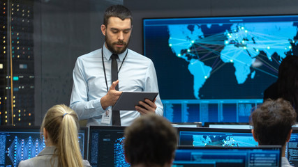 Fototapete - Chief Project Engineer Holds Briefing for a Team of Scientists that are Building Machine Learning System. Displays Show Working Model of Neural Network. 