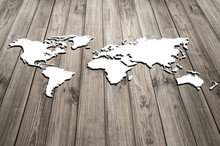 Conceptual Image With World Map On Wooden Wall
