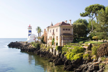 Beautiful View Of The Beach, Lighthouse And Villa On The Sunny Day. Cascais. Portugal.