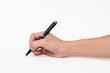 © NaMong Productions - Hand holding pen writing on white background, closeup.