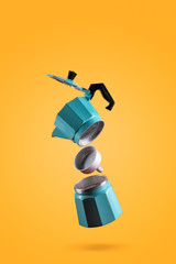 Parts of blue Italian retro coffee maker isolated on orange background. Freeze Motion photo