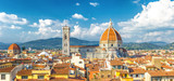 Fototapeta  - Top aerial panoramic view of Florence city with Duomo Cattedrale di Santa Maria del Fiore cathedral, buildings houses with orange red tiled roofs and hills range, blue sky white clouds, Tuscany, Italy