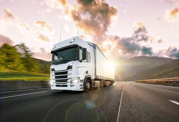 Truck with container on highway, cargo transportation concept. Shaving effect.