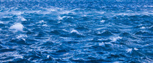 Abstract Ocean Wave Angle View Of Rippled Stormy Water Background Texture.