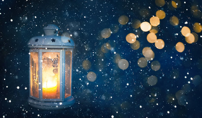 Wall Mural - Winter Christmas Background with Lighted Lantern