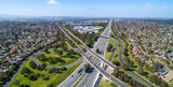 Fototapeta Miasto - Typical road interchange in Melbourne suburbs - aerial panorama