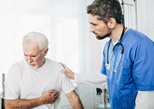 Cuadros en Lienzo Senior patient suffering from heart attack