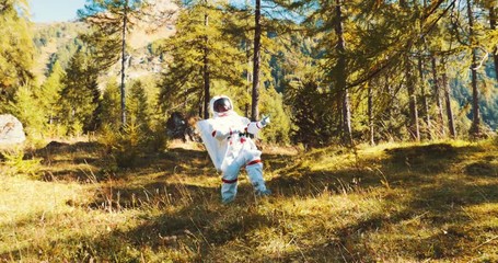 Wall Mural - astronaut has find a new planet similar to earth with nature and forests