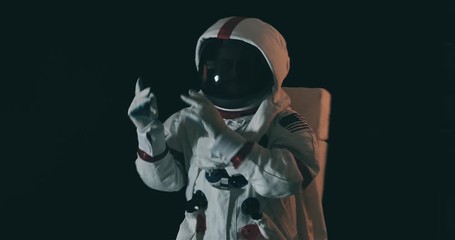 Wall Mural - astronaut lost in space with a message for humanity